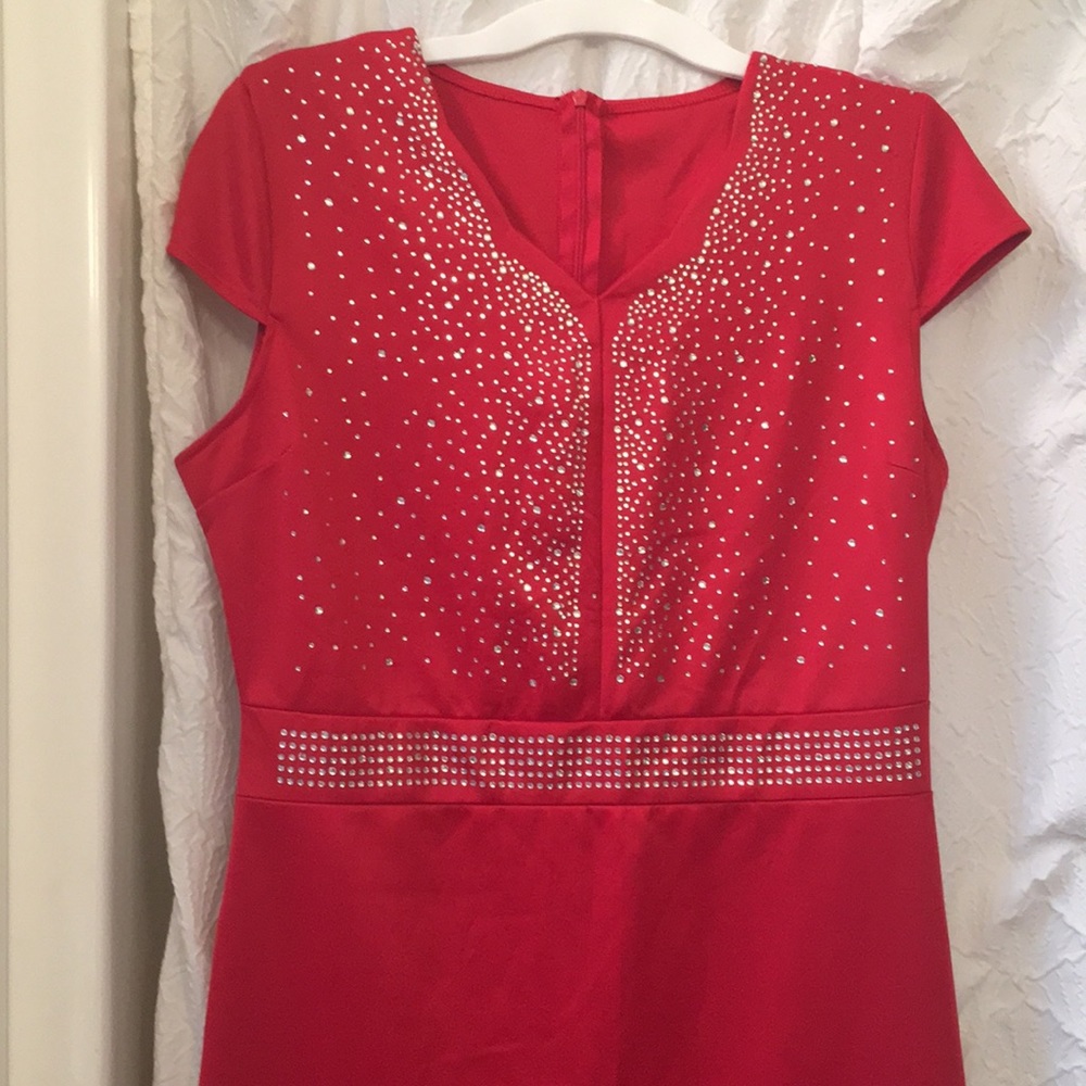 Beautiful Red formal dress. Bought for my sons wedding but never wore it.